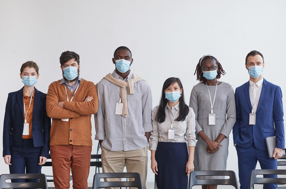 Team of Business People Wearing Masks